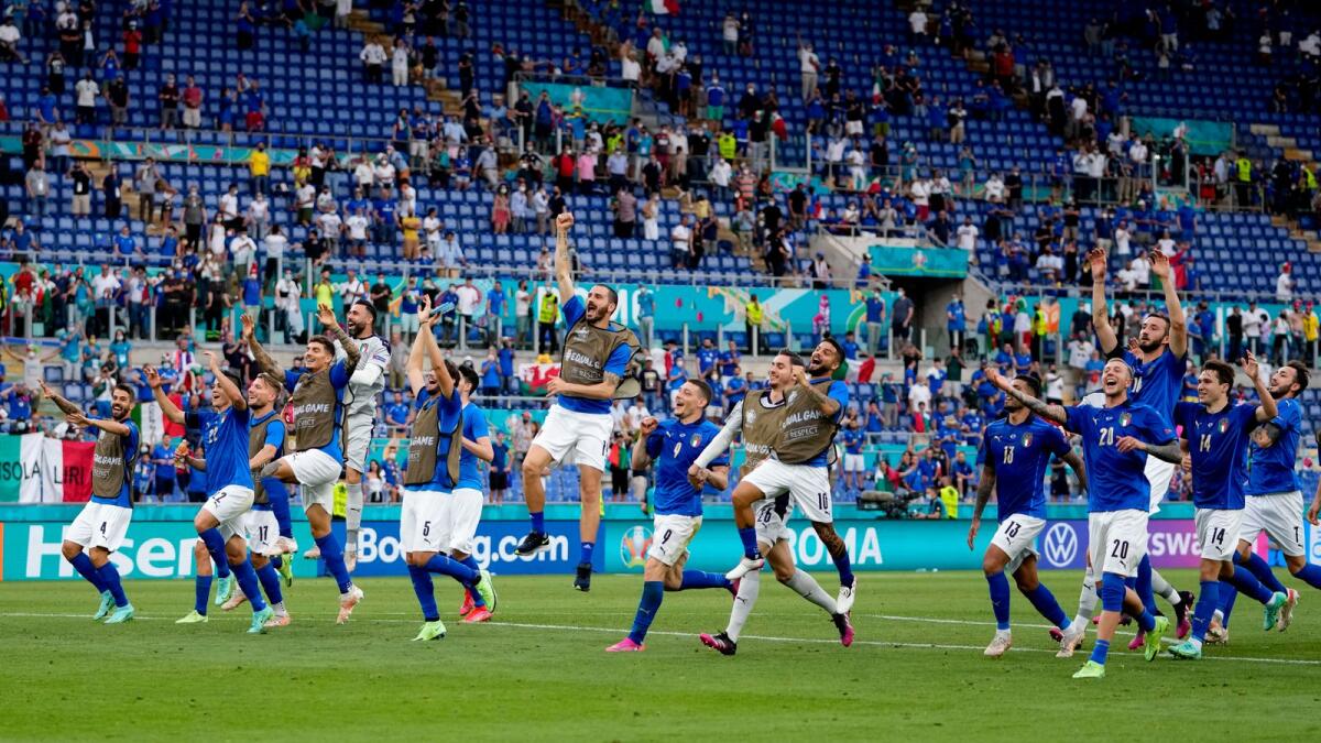 Italy players celebrate their 1-0 win at the end of the Euro 2020  group A match against Wales. — AP