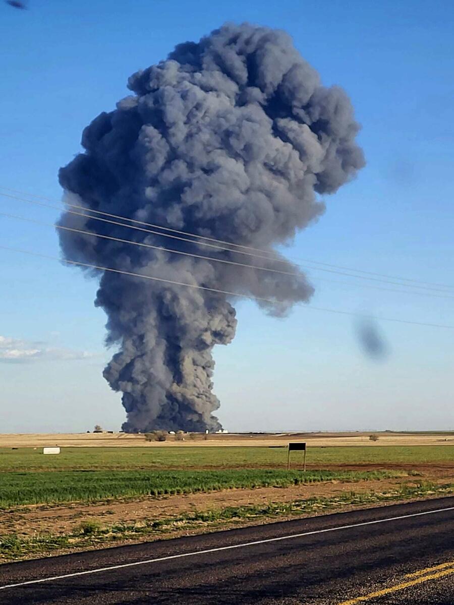 Smoke fills the sky after an explosion and fire at the Southfork Dairy Farms near Dimmitt, Texas, on Monday, April 10, 2023. — AP