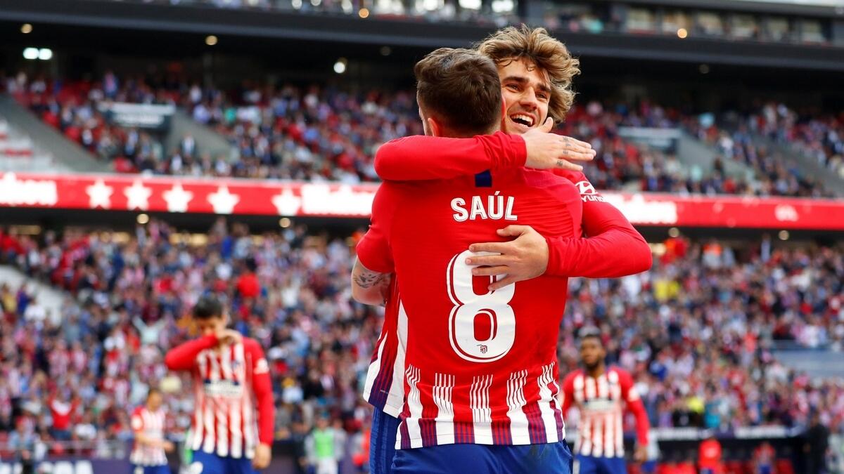 Atletico make Barca wait by squeezing past Valladolid
