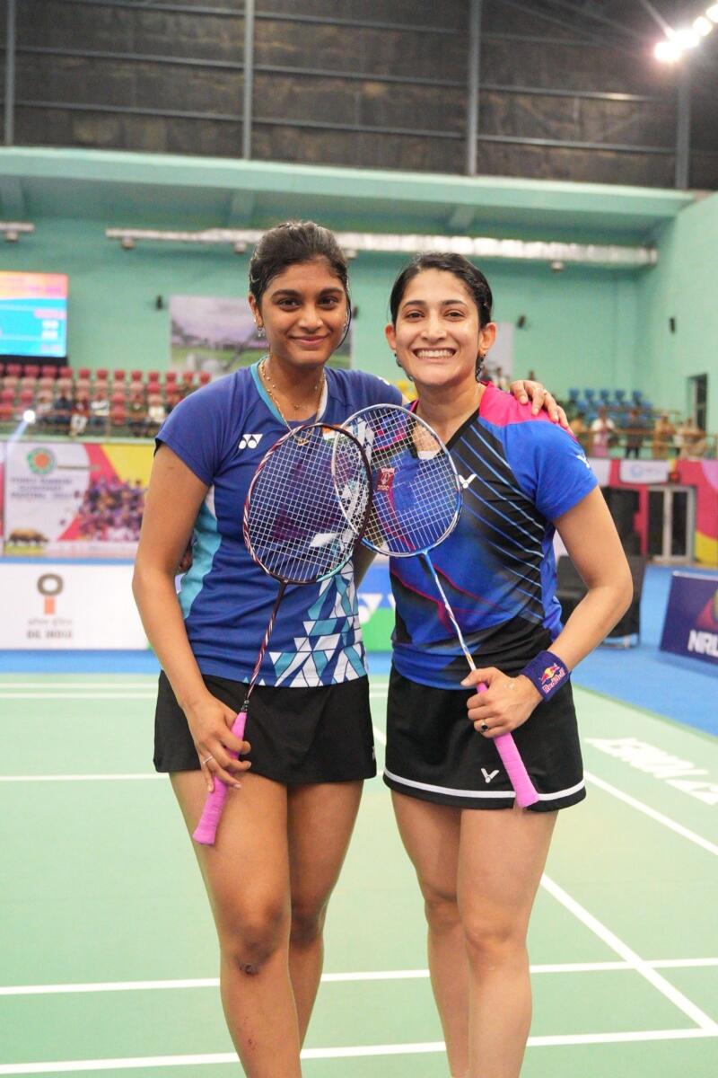 Ashwini Ponnappa (right) poses with Tanisha Crasto after winning the Guwahati Masters last Sunday. — Badminton Federation of India