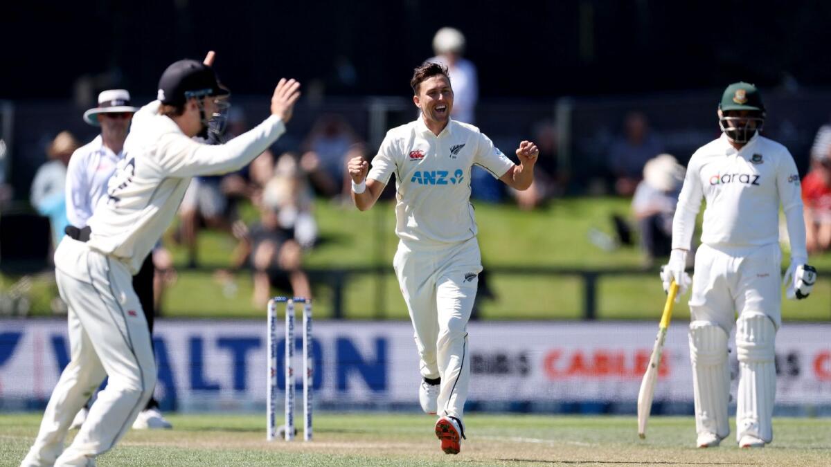 New Zealand's Trent Boult (centre) celebrates the wicket of Bangladesh's Liton Das. (AFP)