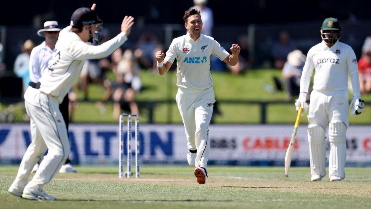 New Zealand's Trent Boult (centre) celebrates the wicket of Bangladesh's Liton Das. (AFP)