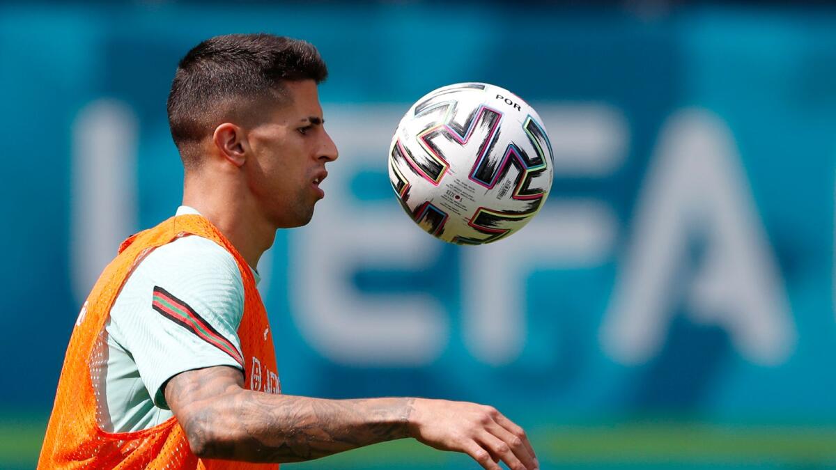Portugal's Joao Cancelo is now self-isolating after Saturday’s test result. — Reuters