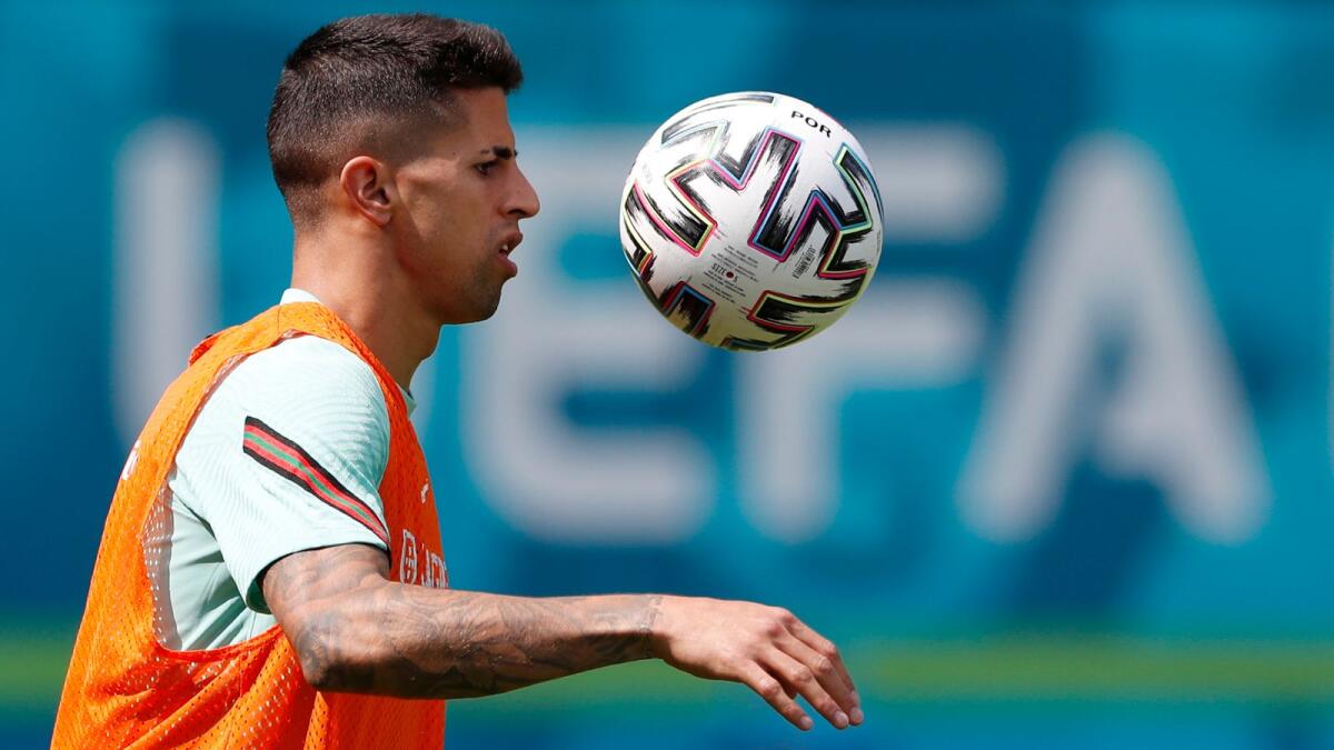 Portugal's Joao Cancelo is now self-isolating after Saturday’s test result. — Reuters
