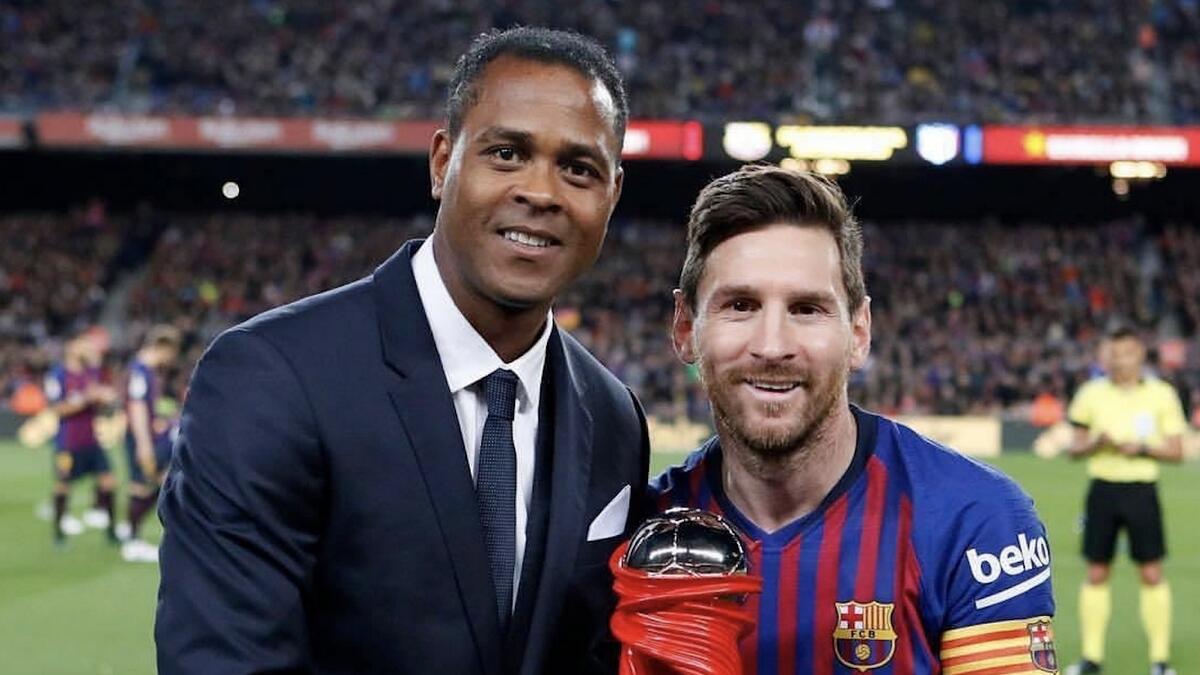 Former Dutch international Patrick Kluivert (left) with Barcelona's Lionel Messi. - Twitter