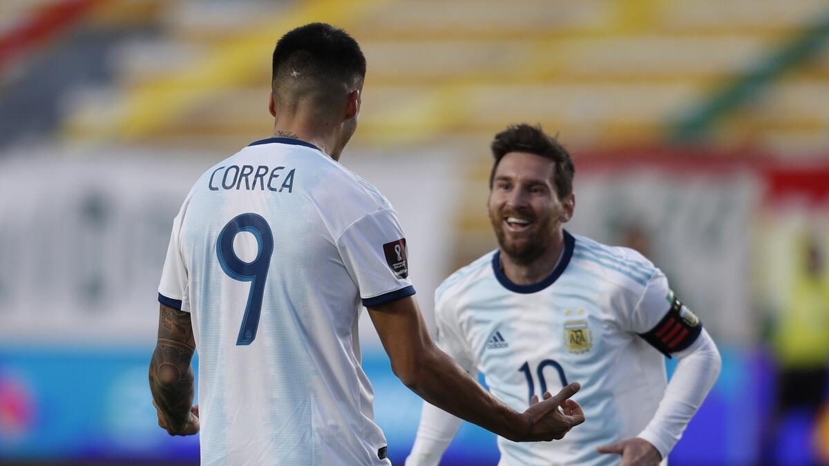 Argentina's Joaquin Correa celebrates his goal with Lionel Messi. (AFP)