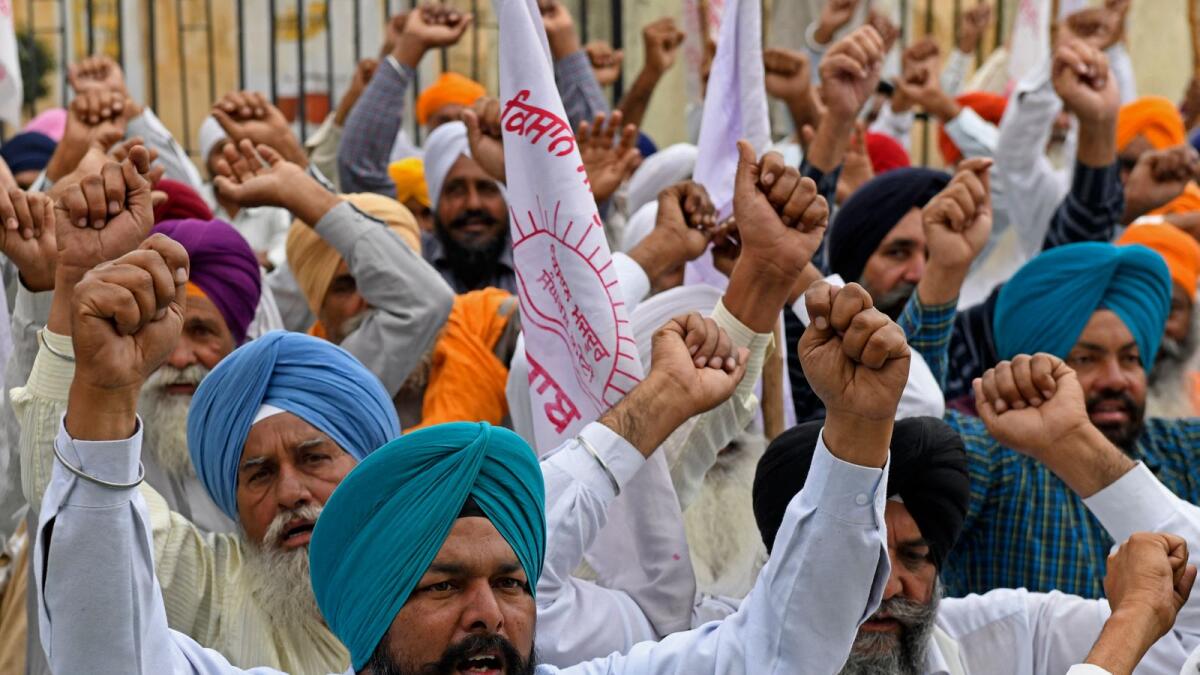 Farmers shout slogans during a protest in Amritsar, Punjab. Photo: AFP