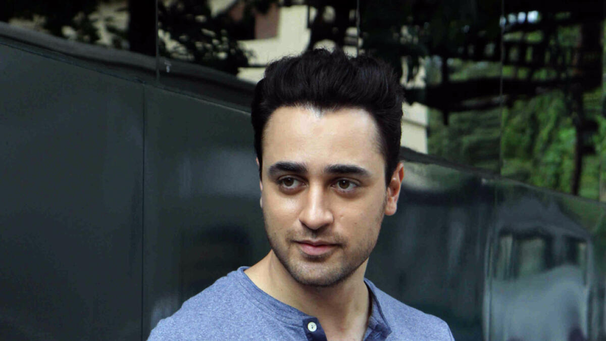 Indian Bollywood actor Imran Khan poses during the promotion of their upcoming Hindi film ?Katti Batti? in Mumbai on August 7, 2015.  AFP PHOTO