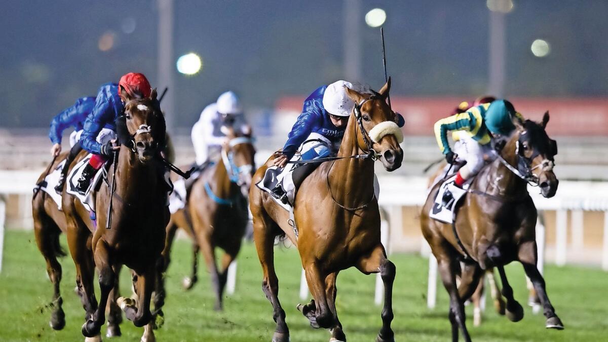 Target on his back: Jockey William Buick pilots Star Safari to victory in the Group 3 Dubai Millennium Stakes at Meydan last year. Star Safari beat stablemate Bedouin’s Story, trained by Saeed bin Suroor, by 1.25 lengths. — Dubai Racing Club