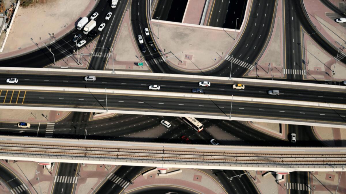An aerial view of the Sheikh Zayed Road section of the E11 highway and the Dubai Metro flyover in Dubai, United Arab Emirates. Photo: AFP