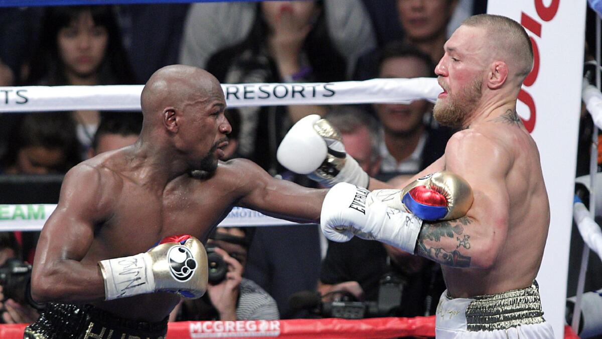 Floyd Mayweather Jr (right) took on Conor McGregor in an exhibition bout in 2017. (AFP file)