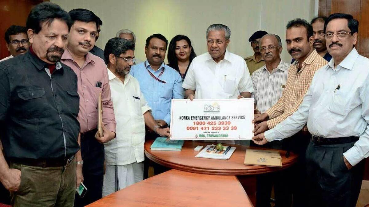 Kerala Chief Minister Pinarayi Vijayan, along with other Norka officials, at the launch of a free ambulance service for NRKs. 