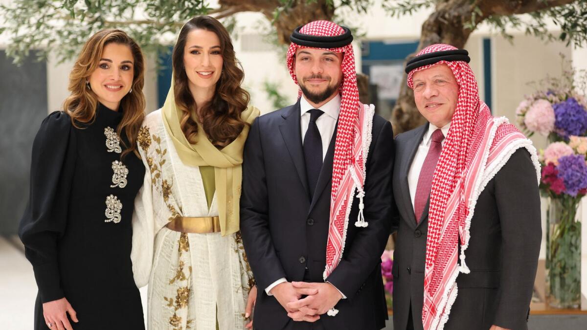 Jordan's King Abdullah II and Queen Rania stand with Crown Prince Hussein during his engagement to Rajwa Al Saif, the youngest daughter of Saudi businessman Khaled Al Saif, in Riyadh. Photo: Reuters
