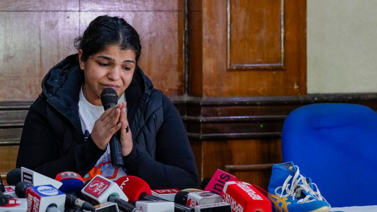 Wrestler Sakshi Malik during a press conference after Sanjay Singh, an associate of BJP MP and former chief of Wrestling Federation of India (WFI) Brij Bhushan Singh, became the new President of WFI. — PTI