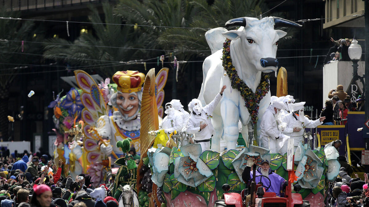 The Krewe of Rex parade rolls through downtown New Orleans on Mardi Gras day in New Orleans.
