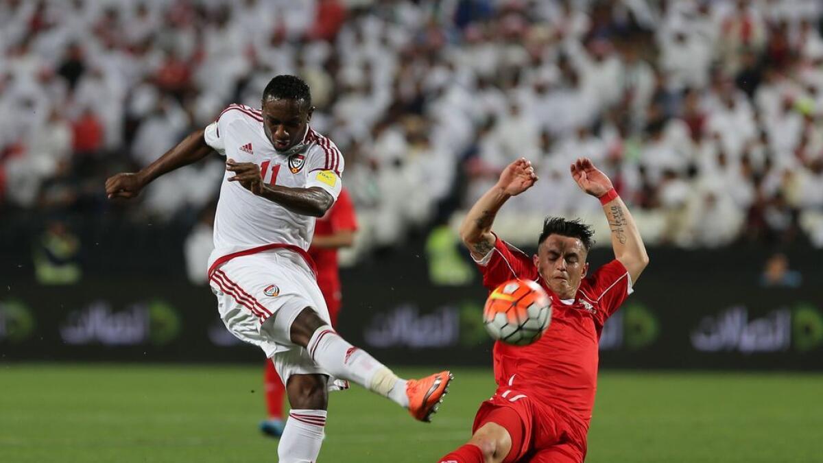 UAE National Team Striker Ahmed Khalil in action against Palestine player during a joint preliminary qualification for the FIFA World Cup held at Mohammed Bin Zayed Stadium.- Photo by Ryan Lim/Khaleej Times