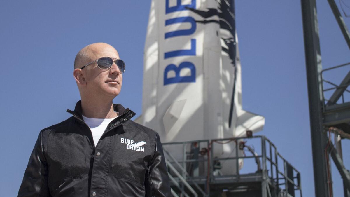 Jeff Bezos, founder of Blue Origin, at New Shepard's West Texas launch facility before the rocket's maiden voyage. Photo: AFP