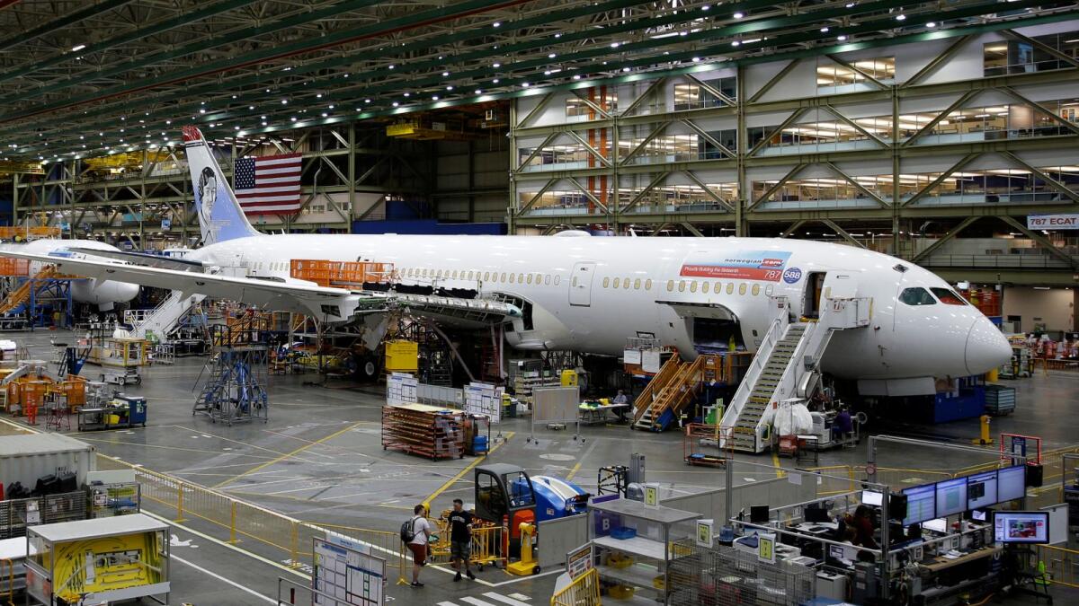 A Boeing 787 airplane being built for Norwegian Air Shuttle is shown at Boeing Co.'s assembly facility, in Everett, Washinton. Boeing is dealing with a new production problem involving its 787 jet, in which inspections have found flaws in the way that sections of the rear of the plane were joined together. — AP file