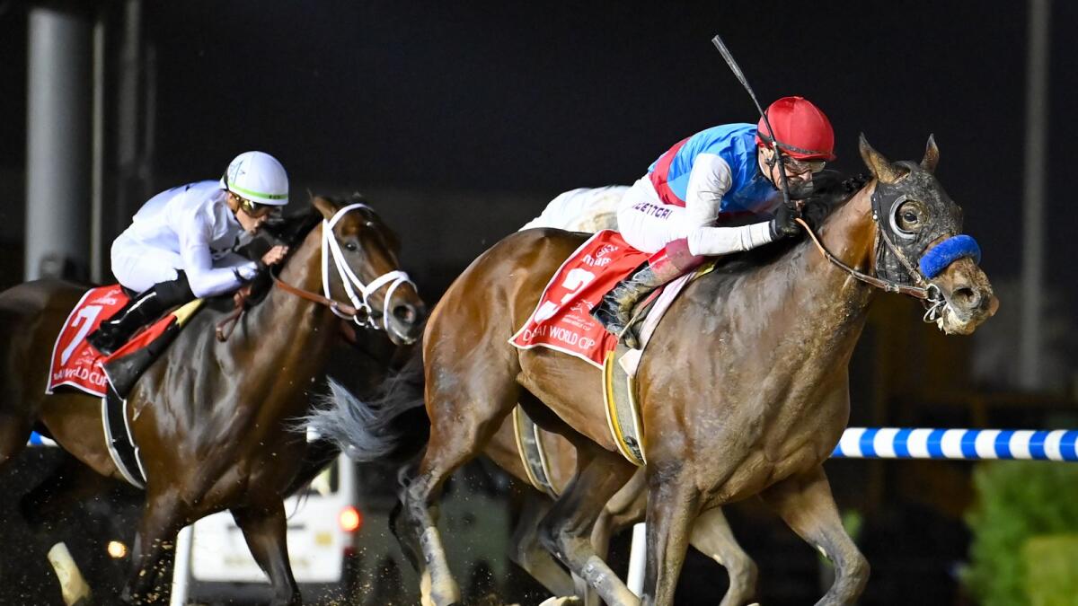 Frankie Dettori rides Country Grammer to victory in the Dubai World Cup. (Photo by M. Sajjad)