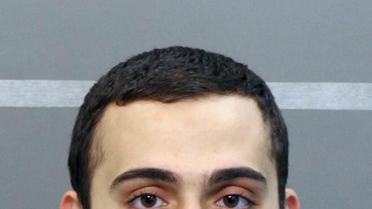 This April 2015 booking photo released by the Hamilton County Sheriffs Office shows a man identified as Mohammad Youssduf Adbulazeer after being detained for a driving offense. A U.S. official speaking on condition of anonymity identified the gunman in shootings at two Chattanooga military facilities as Muhammad Youssef Abdulazeez, who shares the same age and address as the man in the photo. (Hamilton County Sheriffs Office via AP)