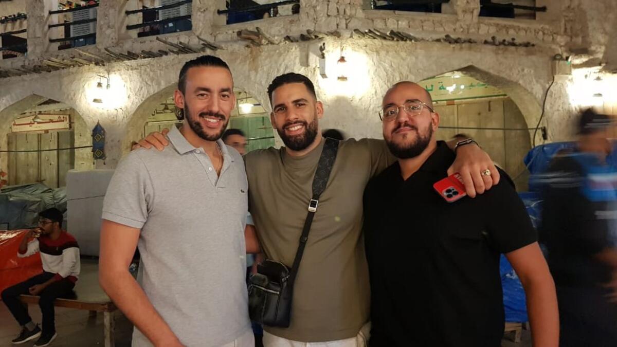 Moroccan fans Afay, Karim, and Kevin at Souq Waqif.