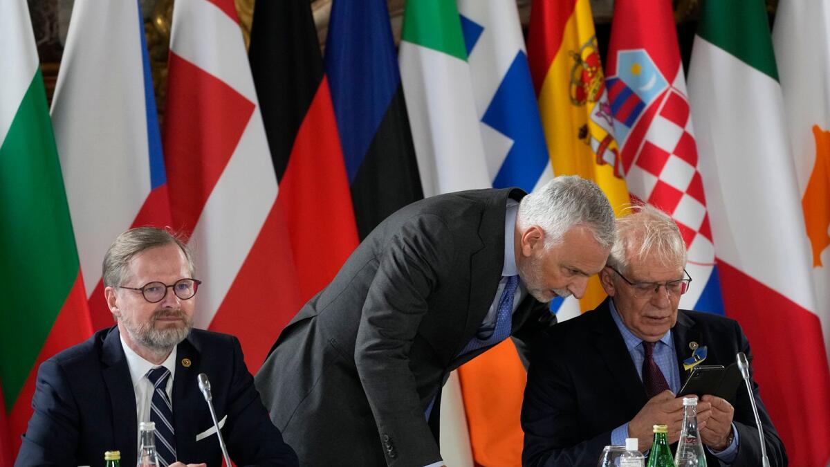Czech Prime Minister Petr Fiala, left, and EU foreign policy chief Josep Borrell attend a round table meeting in France to discuss how to help Ukraine in its war with Russia. – AP