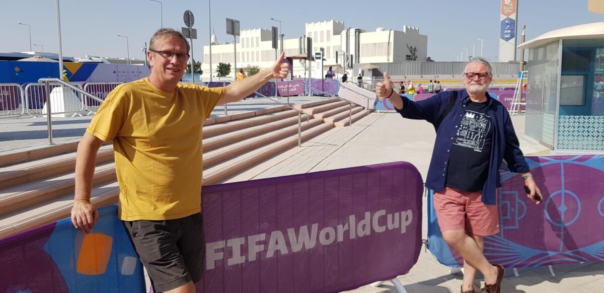 English football fans Ken (left) and Michael who are thrilled to be at the Fifa World Cup in Qatar.. Photo: Rituraj Borkakoty