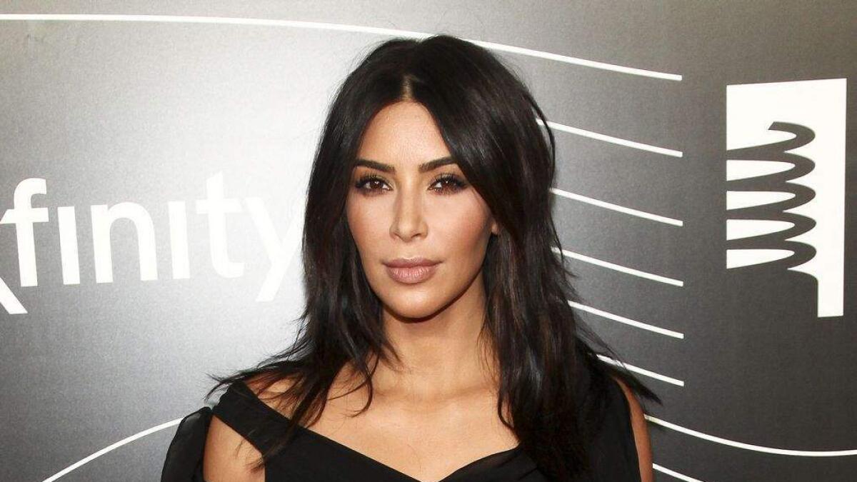 Kim Kardashian hires three cops as escorts