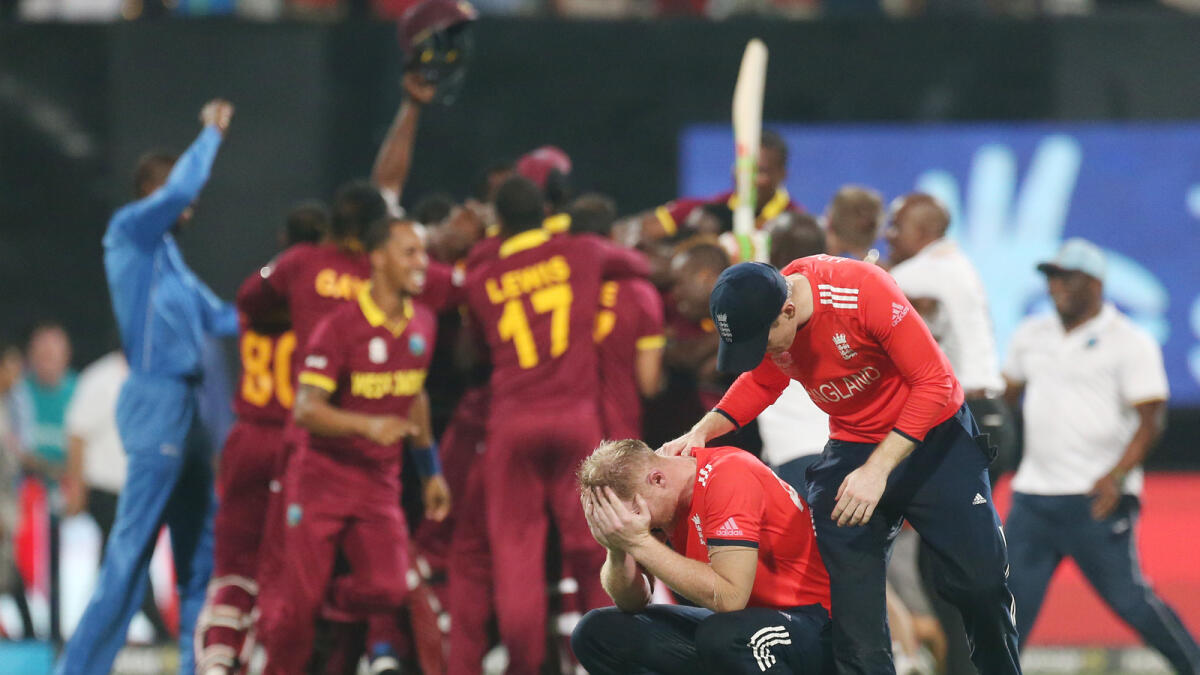 England's Ben Stokes is consoled by his captain Eion Morgan following their loss to the West Indies in the final of the ICC World Twenty20 2016 cricket tournament at Eden Gardens in Kolkata, India, Sunday, April 3, 2016.