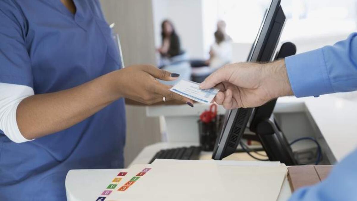 UAE employees need not bear health insurance cost