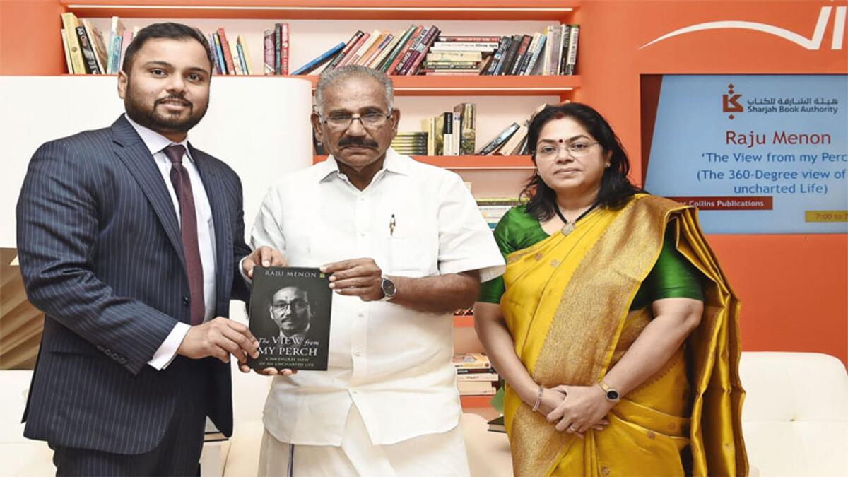 A K Saseendran, minister of Kerala forests and wildlife protection, releasing the book ‘The view from my perch’, written by Raju Menon. Shamlal Ahamed, MD — international operations, Malabar Gold and Diamonds  receives the copy in the presence of Girija Menon.