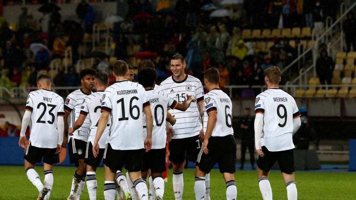 Germany players celebrate their second goal against  North Macedonia. (AP)