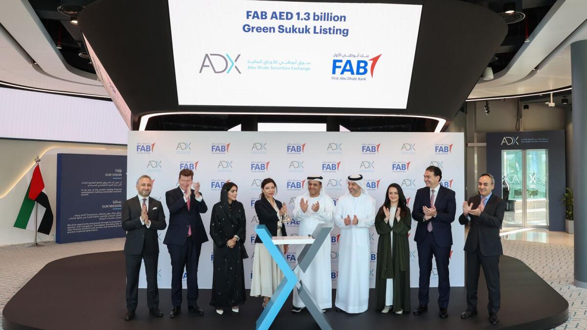 FAB and ADX officials at the sukuk-listing ceremony. — Supplied photo