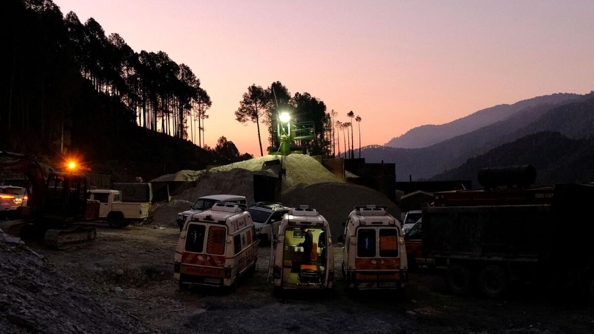 Ambulances are parked outside a tunnel where workers are trapped after the tunnel collapsed in Uttarkashi in the northern state of Uttarakhand, India, November 23, 2023. Photo: Reuters