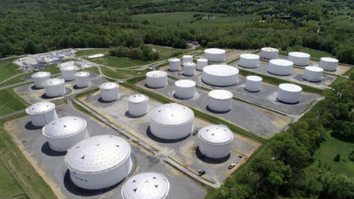 Holding tanks are seen in an aerial photograph at Colonial Pipeline's Dorsey Junction Station in Woodbine, Maryland. — Reuters file