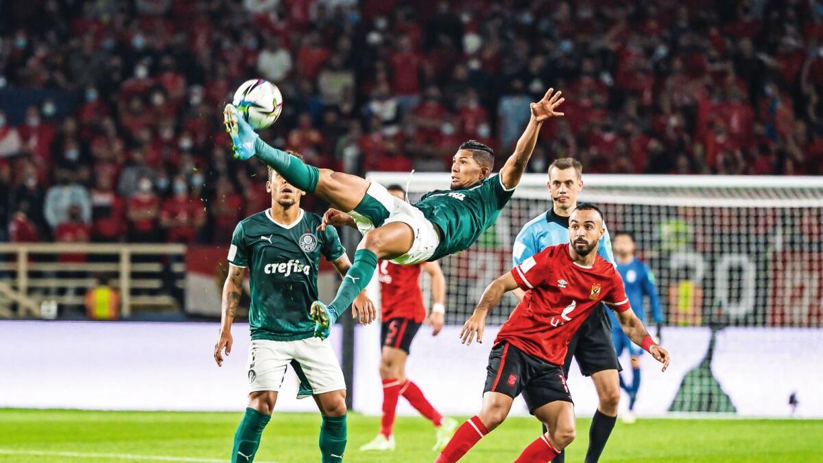 Like a bird: Palmeiras striker Rony (in the air) goes for an aerial ball while teammate Marcos Rocha (left) and Al Ahly’s Mohamed Afsha look during their Fifa Club World Cup semifinal on Tuesday night. — Neeraj Murali