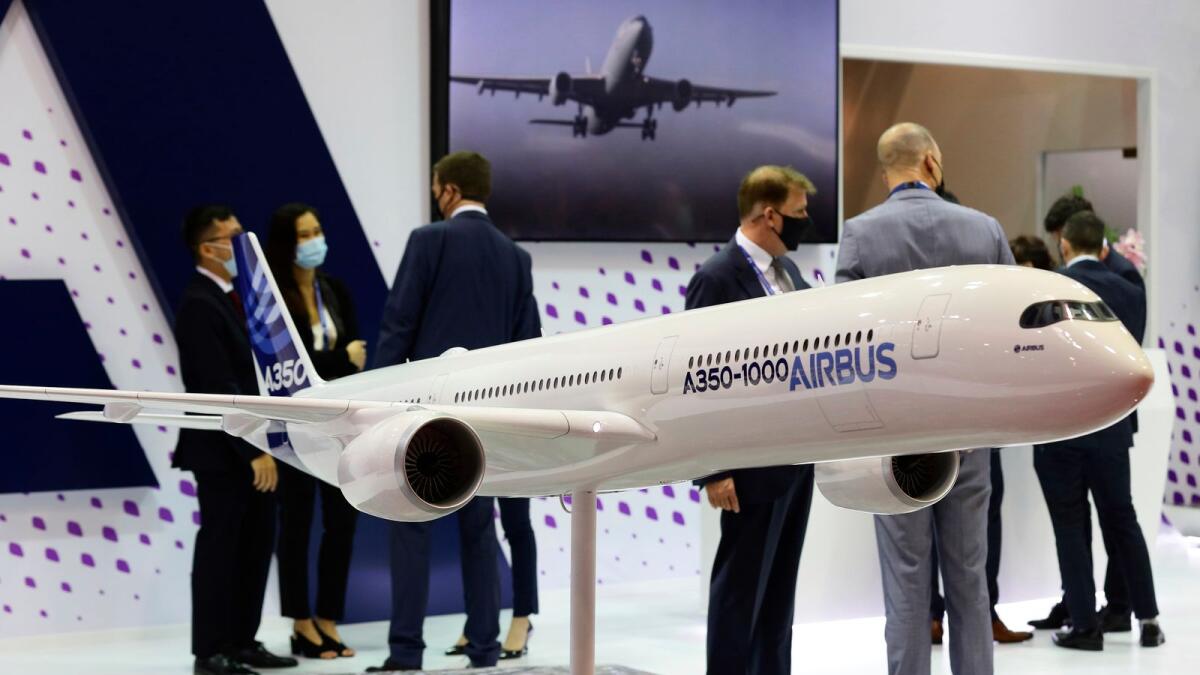 The Airbus A350-1000 model aircraft is on display during the Singapore Airshow 2022 at Changi Exhibition Centre in Singapore on Tuesday — AP 