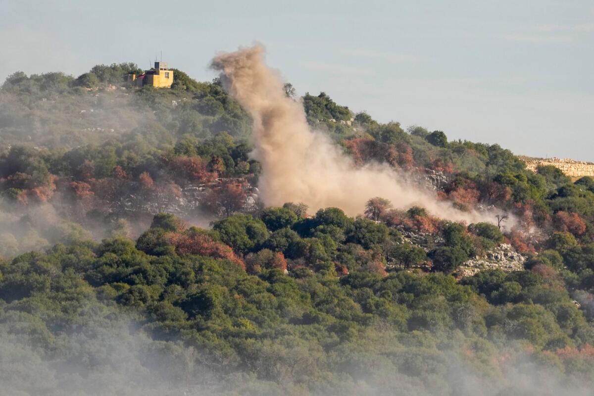 Smoke rises from Israeli artillery shelling on the outskirts of Yaroun, a Lebanese border village with Israel. — AP