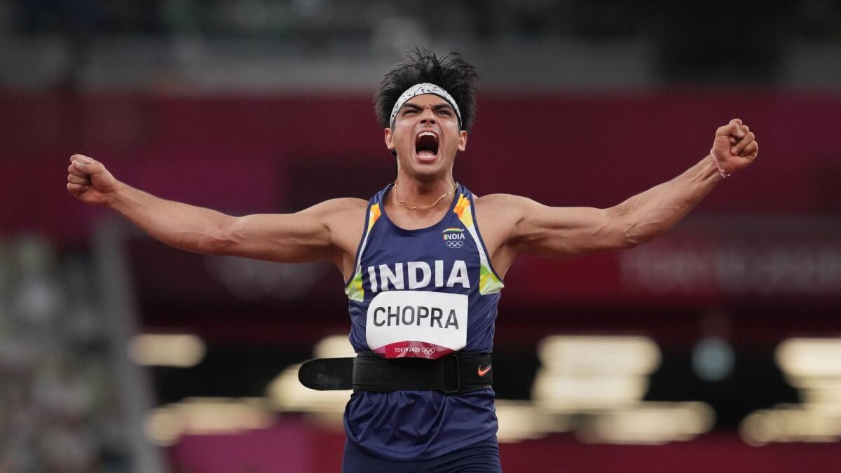 Neeraj Chopra reacts as he competes in the final of the men's javelin throw event at the 2020 Summer Olympics, in Tokyo. — PTI