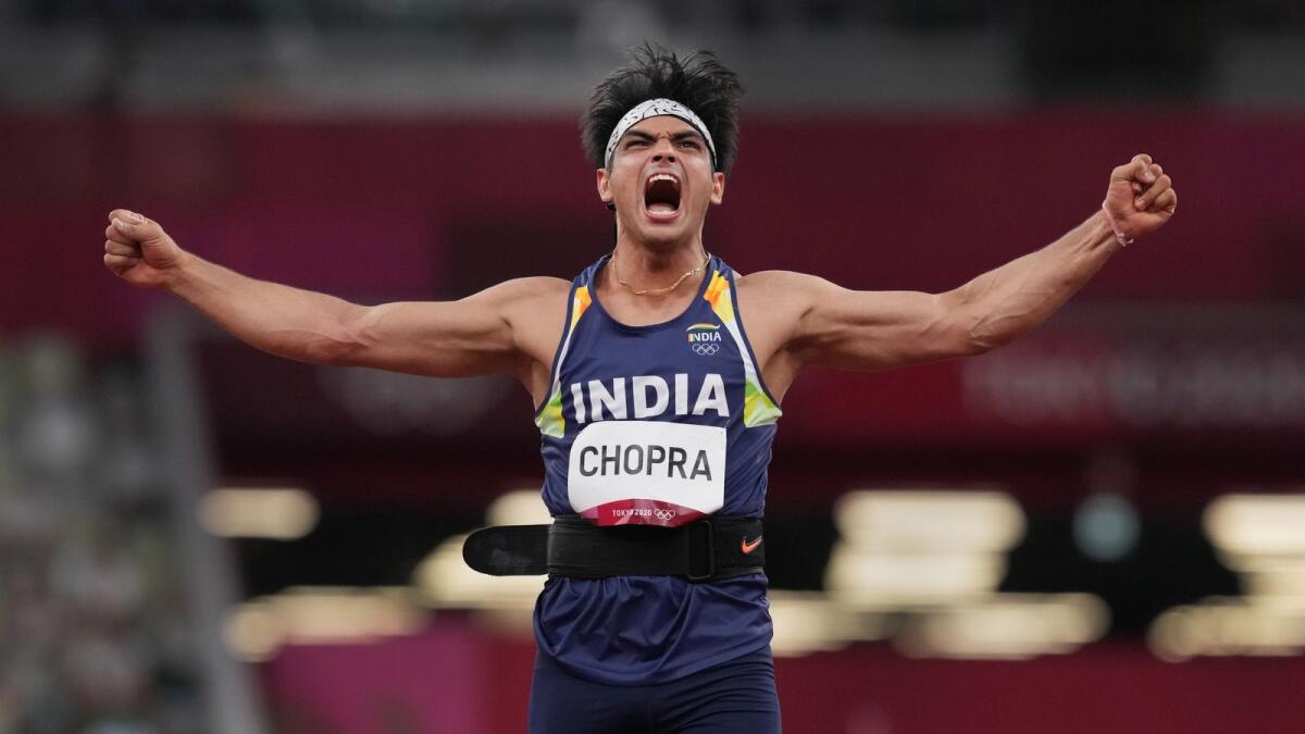 Neeraj Chopra reacts as he competes in the final of the men's javelin throw event at the 2020 Summer Olympics, in Tokyo. — PTI