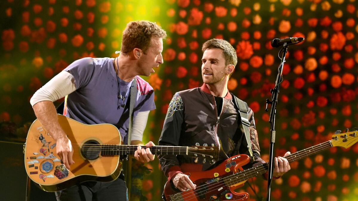 Musicians Chris Martin (L) and Guy Berryman of Coldplay perform at the Rose Bowl on October 6, 2017 in Pasadena, California. Photo: Getty Images