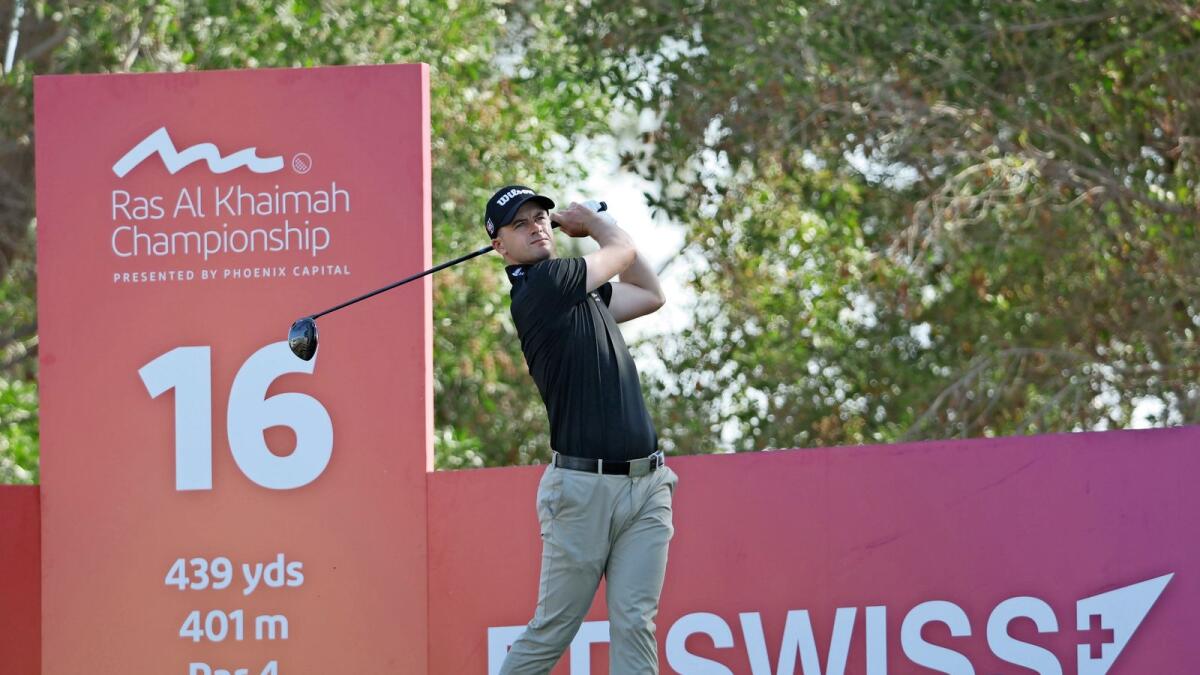 Sublime: Scotland’s David Law tees off from the par-4 16th during the second round of the Ras Al Khaimah Championship at the Al Hamra Golf Club on Friday. — Supplied photo