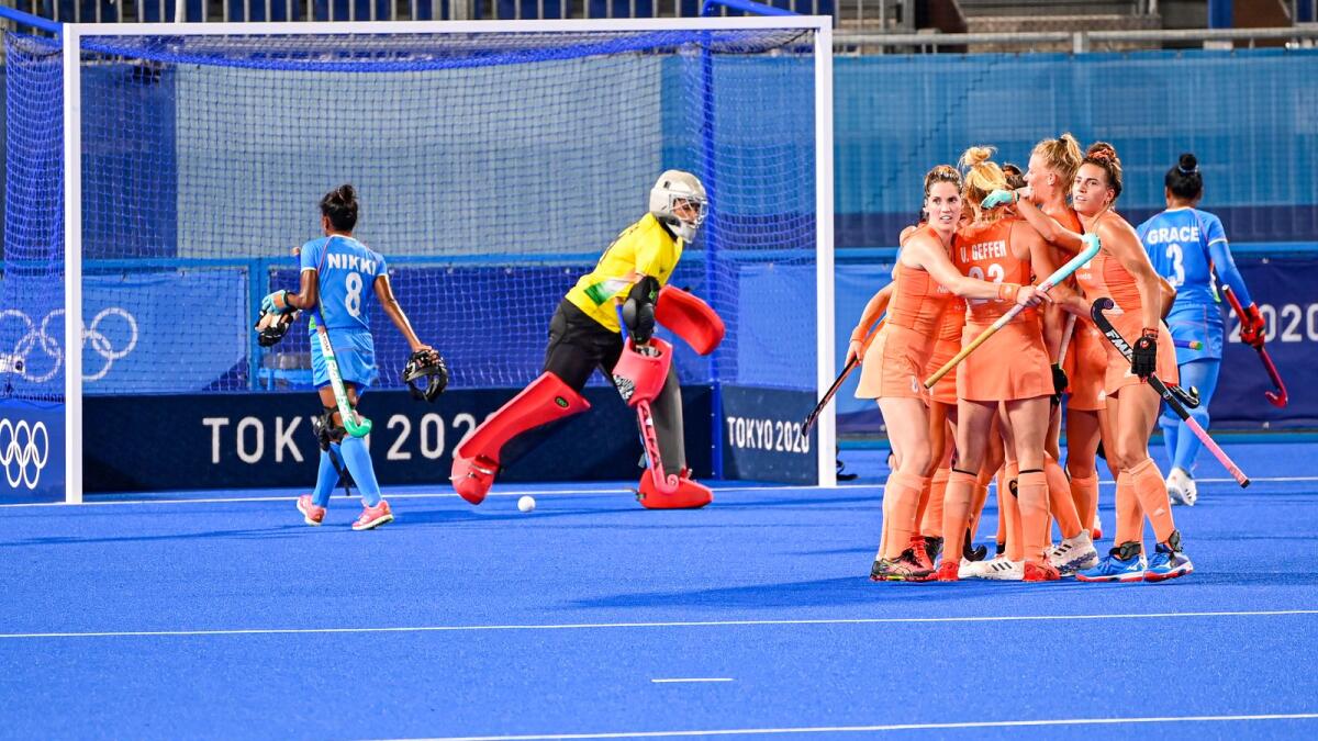 Netherland's team members celebrate after their fifth goal against India during the Summer Olympics Pool A women hockey match. — PTI