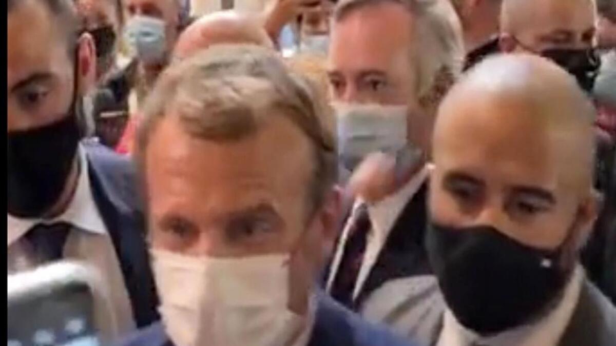 This image from video made available by Lyonmag.com shows an egg thrown toward French President Emmanuel Macron. Photo: AP