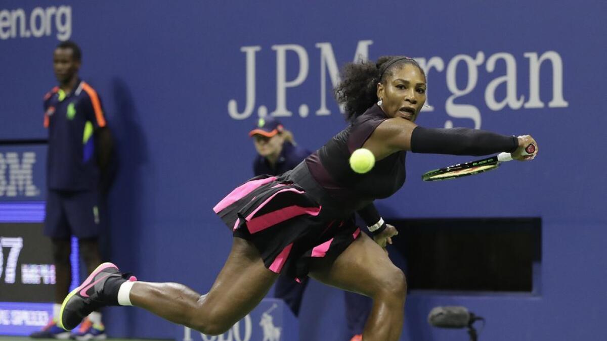 Tennis:Murray, Serena ride strong serves into US Open second round