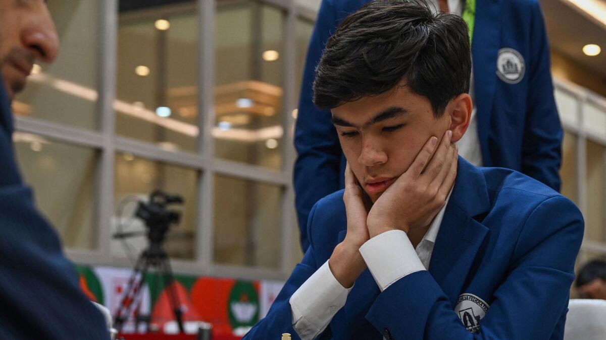 Uzbekistan's Javokhir Sindarov during the ninth round against Armenia at the 44th Chess Olympiad on Sunday. — AFP