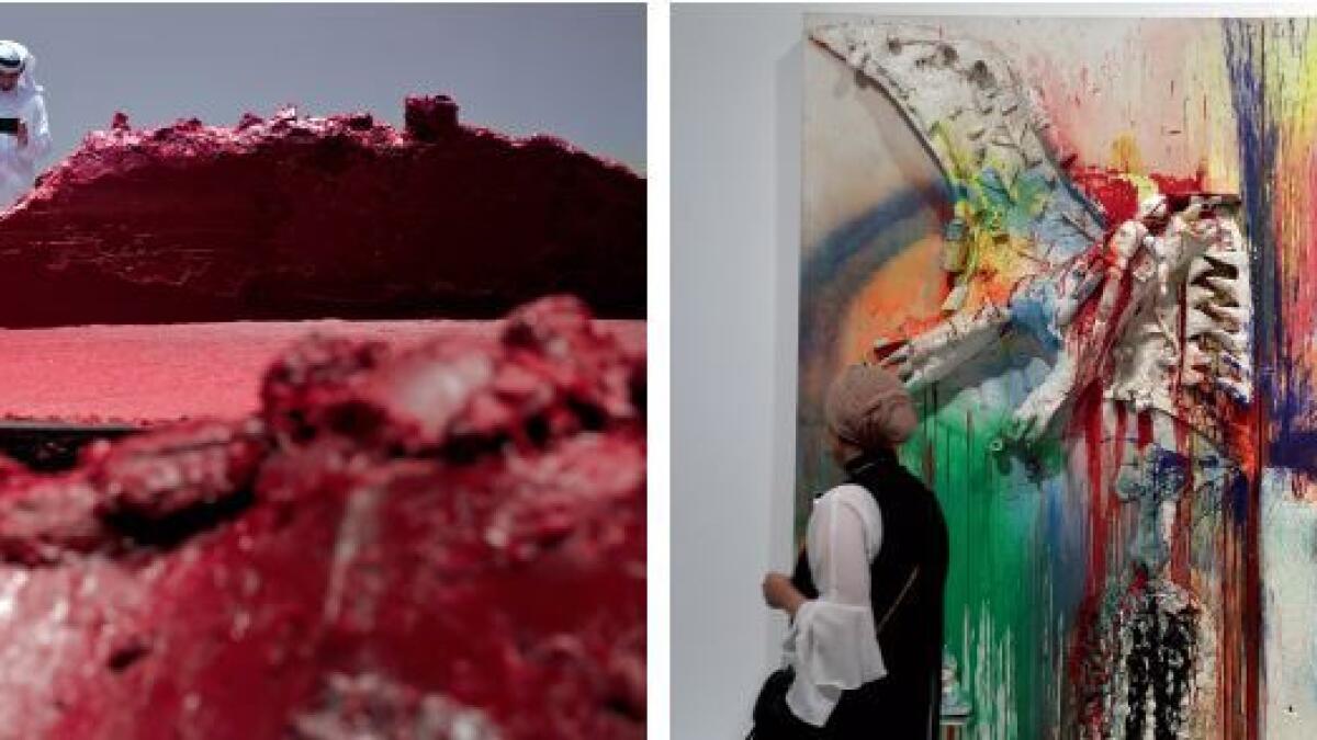 A sculptural installation, which is composed of nearly 25 tonnes of red wax (left), was one of the major attractions at the Creative Act exhibition opened at the Manarat Al Saadiyat. 