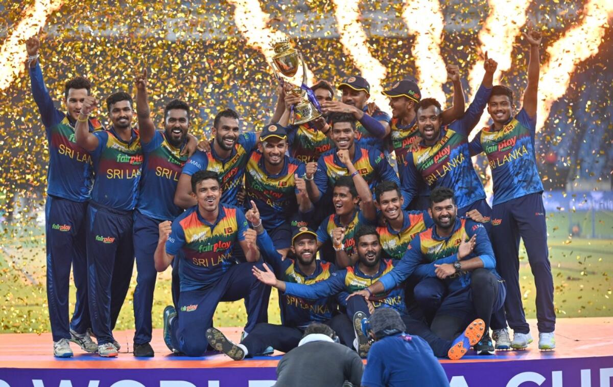 Sri Lankan team with the winning trophy. Photo: M Sajjad