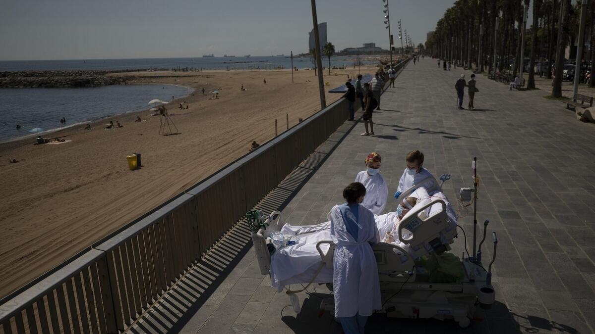 Spanish doctors, hope, beach trips, help, ICU, coronavirus, patients