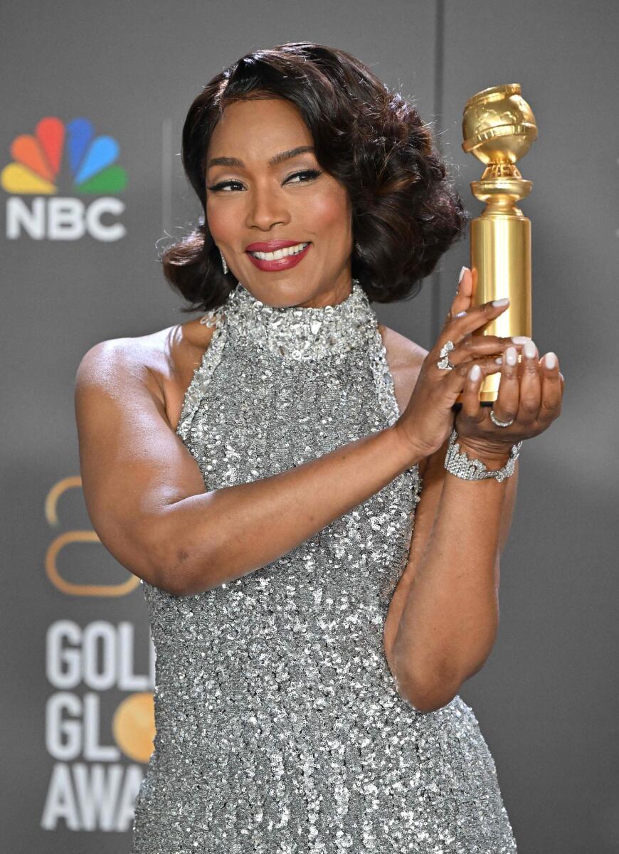 US actress Angela Bassett poses with the award for Best Supporting Actress - Motion Picture for 'Black Panther: Wakanda Forever'